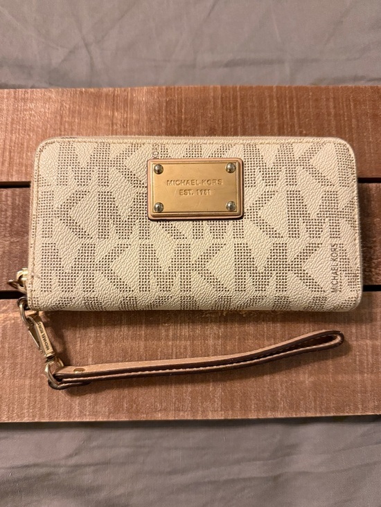 Michael Kors Handbags - Michael Kors Beige MK Logo Zip Wristlet with Gold Plaque
